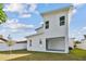 Modern home exterior showcasing a unique architectural design at 3119 W Cypress St, Tampa, FL 33607