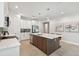 Modern kitchen with stainless steel appliances and white cabinetry at 3119 W Cypress St, Tampa, FL 33607