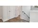 Hallway with access to bathroom and upper level at 3119 W Cypress St, Tampa, FL 33607