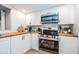 Clean kitchen features modern appliances and butcher block countertops at 12904 College Hill Dr, Hudson, FL 34667