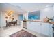 Bright kitchen with white cabinets, stainless steel appliances, and wood countertops at 12904 College Hill Dr, Hudson, FL 34667