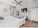 Spacious bedroom with wood-look floors and plenty of natural light at 14173 Pullman Dr, Spring Hill, FL 34609
