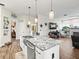 Eat-in kitchen with large island and open view to living area at 14173 Pullman Dr, Spring Hill, FL 34609