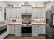Modern kitchen with stainless steel appliances and ample cabinetry at 14173 Pullman Dr, Spring Hill, FL 34609