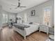 Spacious main bedroom with king bed and private access to backyard at 14173 Pullman Dr, Spring Hill, FL 34609