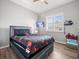 Spacious bedroom with a TV and Spiderman bedding at 14173 Pullman Dr, Spring Hill, FL 34609