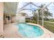 Large screened-in pool with ample patio space at 12923 Carlington Ln, Riverview, FL 33579