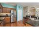 Modern kitchen with stainless steel appliances and a pantry at 12923 Carlington Ln, Riverview, FL 33579