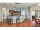 Spacious kitchen with a breakfast bar and hardwood floors at 12923 Carlington Ln, Riverview, FL 33579