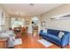 Dining area with hardwood floors and a wooden table for six at 12923 Carlington Ln, Riverview, FL 33579