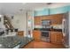 Kitchen with stainless steel appliances and a large island at 12923 Carlington Ln, Riverview, FL 33579