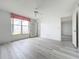 Spacious bedroom with light wood floors and large window for natural light at 4410 Fairways Blvd Blvd # 607, Bradenton, FL 34209