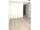 Bedroom featuring light-colored hardwood floors and a closet at 4410 Fairways Blvd Blvd # 607, Bradenton, FL 34209
