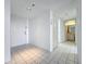 Clean entryway with tile floors and a view to the bathroom at 4410 Fairways Blvd Blvd # 607, Bradenton, FL 34209