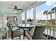 Enjoy water views from this condo's balcony, complete with a bistro table and chairs at 10216 Regal Dr # 310, Largo, FL 33774