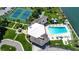 Community pool and tennis courts from above at 10216 Regal Dr # 310, Largo, FL 33774