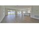 Open concept living room and kitchen with hardwood floors at 2919 W Elrod Ave, Tampa, FL 33611