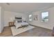 Main bedroom with hardwood floors and neutral decor at 2919 W Elrod Ave, Tampa, FL 33611