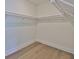 Spacious walk-in closet with ample shelving at 2919 W Elrod Ave, Tampa, FL 33611