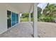 Covered patio with gray tile flooring at 2919 W Elrod Ave, Tampa, FL 33611