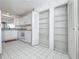 Bright kitchen features white cabinets, appliances, and ample storage at 4410 Fairways Blvd Blvd # 607, Bradenton, FL 34209