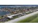 Aerial view of beachfront property, showing building, pool, and beach at 3341 Gulf Blvd, Belleair Beach, FL 33786