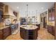Gourmet kitchen with granite countertops and custom cabinetry at 3341 Gulf Blvd, Belleair Beach, FL 33786