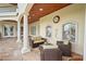 Covered patio with seating area, providing a relaxing outdoor space at 3341 Gulf Blvd, Belleair Beach, FL 33786