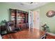 Spacious office with hardwood floors and large windows at 3341 Gulf Blvd, Belleair Beach, FL 33786