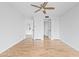 Spacious bedroom with hardwood floors and mirrored closet doors at 500 N Osceola Ave # 802, Clearwater, FL 33755