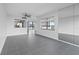 Spacious living room with gray tile floors and city view at 500 N Osceola Ave # 802, Clearwater, FL 33755