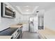 Modern kitchen with stainless steel appliances and ample counter space at 500 N Osceola Ave # 802, Clearwater, FL 33755