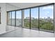 Bright living room with large windows and city views at 500 N Osceola Ave # 802, Clearwater, FL 33755