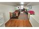 Spacious bonus room with hardwood floors, office space, and sleeping area at 26240 Willow St, Brooksville, FL 34601
