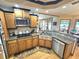 Modern kitchen with stainless steel appliances and granite countertops at 26240 Willow St, Brooksville, FL 34601