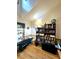Well-organized home office with built-in shelves and a desk at 26240 Willow St, Brooksville, FL 34601