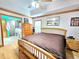 Spacious bedroom with wood floors and an ensuite bathroom at 26240 Willow St, Brooksville, FL 34601