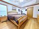 Large bedroom with wood floors and ample closet space at 26240 Willow St, Brooksville, FL 34601