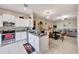 Modern kitchen features stainless steel appliances and granite countertops at 13285 Crest Lake Dr, Hudson, FL 34669