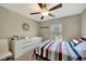 Bright bedroom with a full-sized bed and plenty of closet space at 13285 Crest Lake Dr, Hudson, FL 34669