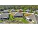 Aerial view of single-Gathering home with screened lanai and conservation lot at 13285 Crest Lake Dr, Hudson, FL 34669