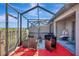 Relaxing screened patio perfect for outdoor living at 13285 Crest Lake Dr, Hudson, FL 34669