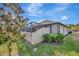 Private backyard with fenced area and landscaping at 13285 Crest Lake Dr, Hudson, FL 34669