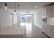 Modern kitchen with island and view to living room at 920 N Osceola Ave # 401, Clearwater, FL 33755