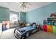 bedroom with a race car bed and storage at 8067 Tranquil Dr, Spring Hill, FL 34606