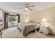 Comfortable bedroom with pool view and ample closet space at 8067 Tranquil Dr, Spring Hill, FL 34606