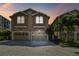 Two-story townhouse with double garage, showcasing attractive architecture at 348 Larboard Way, Clearwater, FL 33767