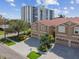 Luxury townhouses with attached garages and lush landscaping at 348 Larboard Way, Clearwater, FL 33767