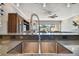 Modern kitchen sink with stainless steel double basin and sleek faucet at 348 Larboard Way, Clearwater, FL 33767