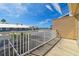 Private balcony with water views and white railing at 348 Larboard Way, Clearwater, FL 33767